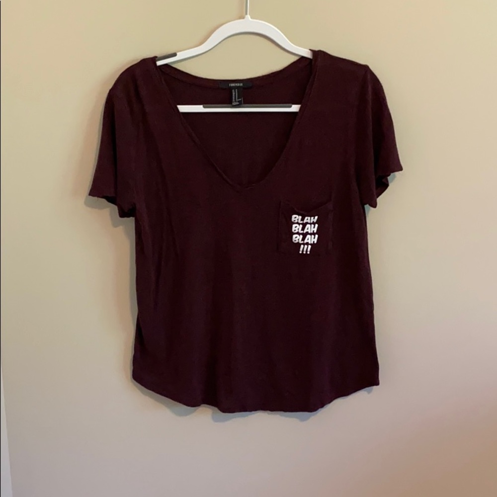 red pocket tshirt, slightly cropped